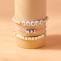 Cream Tile Bead Gold Stretch Bracelet Gallery Thumbnail